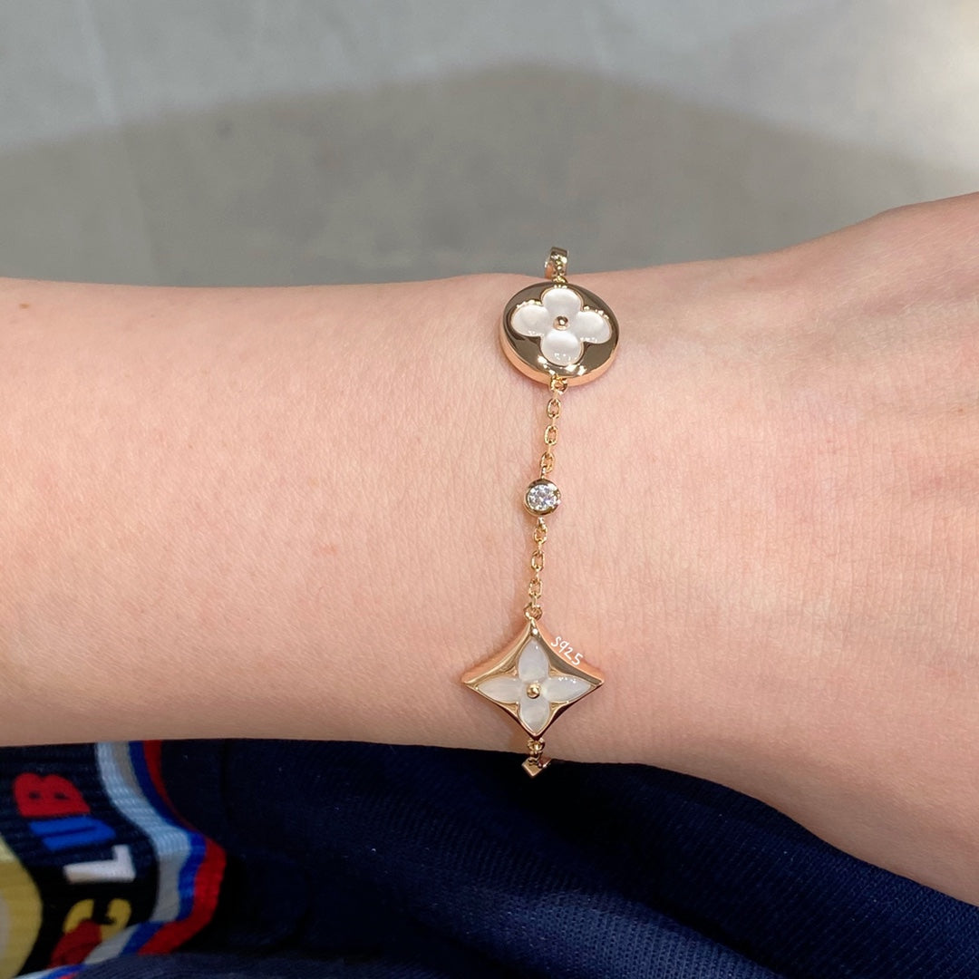 [Solara Jewelry]STAR AND SUN 4 MOTIF WHITE MOP PINK GOLD BRACELET