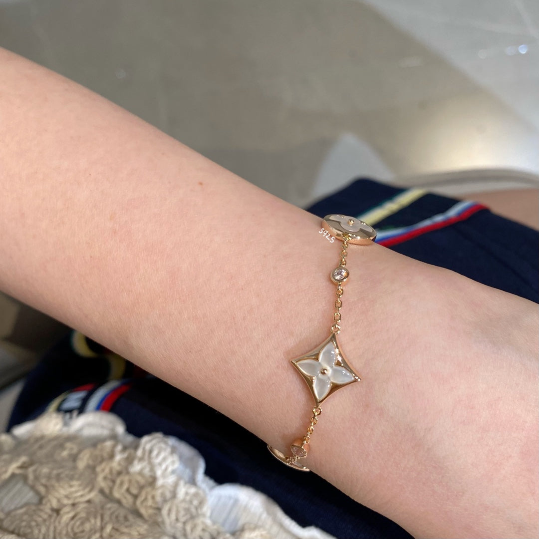 [Solara Jewelry]STAR AND SUN 4 MOTIF WHITE MOP PINK GOLD BRACELET